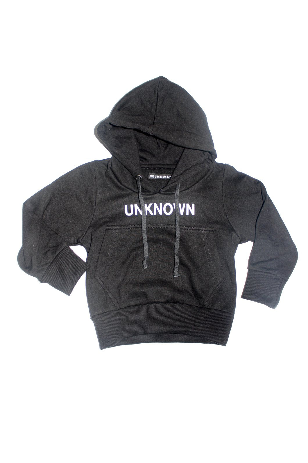 A black THE UNKNOWN CHILDREN hoodie with the text 'UNKNOWN' written across the front in bold white letters, designed for children.